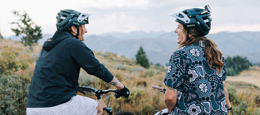 Mountain bikers wearing the Smith x Wild Rye Forefront 3 Helmet